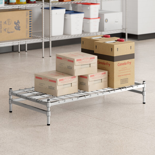 Regency Spec Line 24" x 48" x 8" NSF Stainless Steel Wire Stationary Dunnage Rack with Wire Mat and 3-Sided Frame