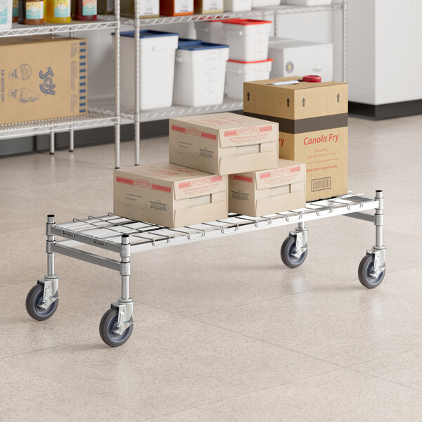 Regency Spec Line 18" x 48" x 14" NSF Stainless Steel Wire Mobile Dunnage Rack with Wire Mat and 3-Sided Frame