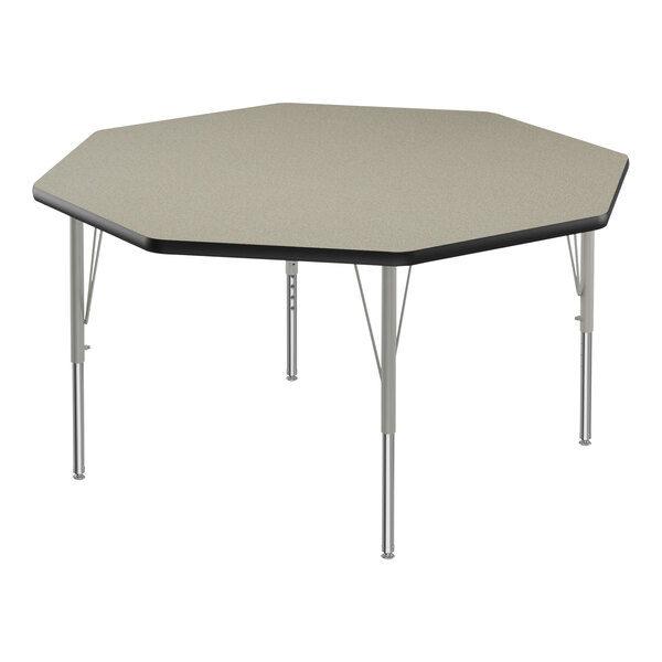 A Correll Savannah Sand hexagon activity table with silver legs and black edging.