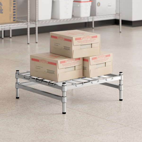 Regency Spec Line 24" x 24" x 8" NSF Stainless Steel Wire Stationary Dunnage Rack with Wire Mat and 3-Sided Frame