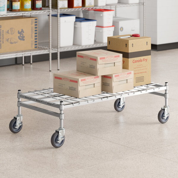 Regency Spec Line 24" x 48" x 14" NSF Stainless Steel Wire Mobile Dunnage Rack with Wire Mat and 3-Sided Frame
