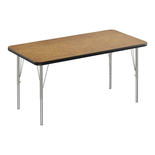 A rectangular Correll activity table with a wooden surface and black edge with silver legs.