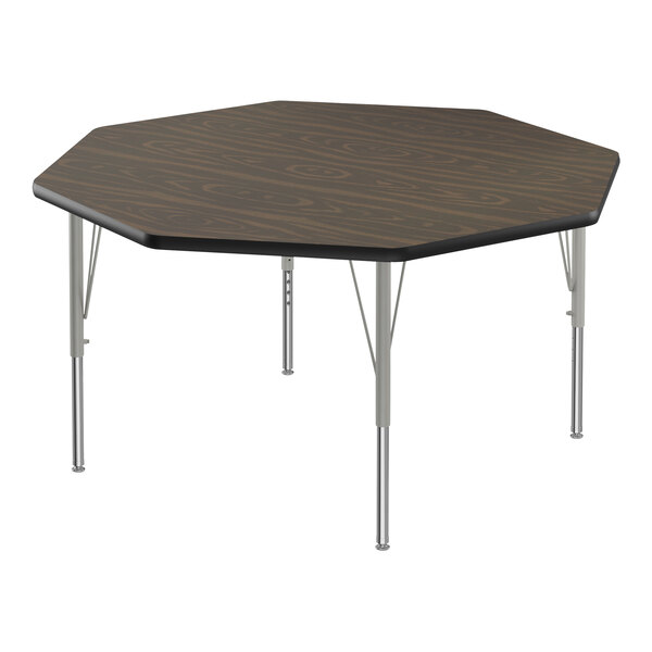 A Correll activity table with a walnut wood surface and silver metal legs.