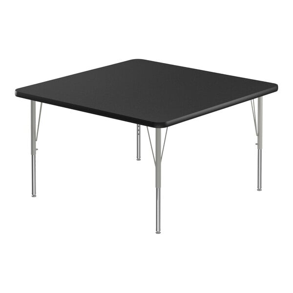 A square black Correll activity table with silver legs.
