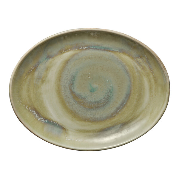 A white porcelain Heart & Soul oval coupe platter with a thyme swirl pattern.
