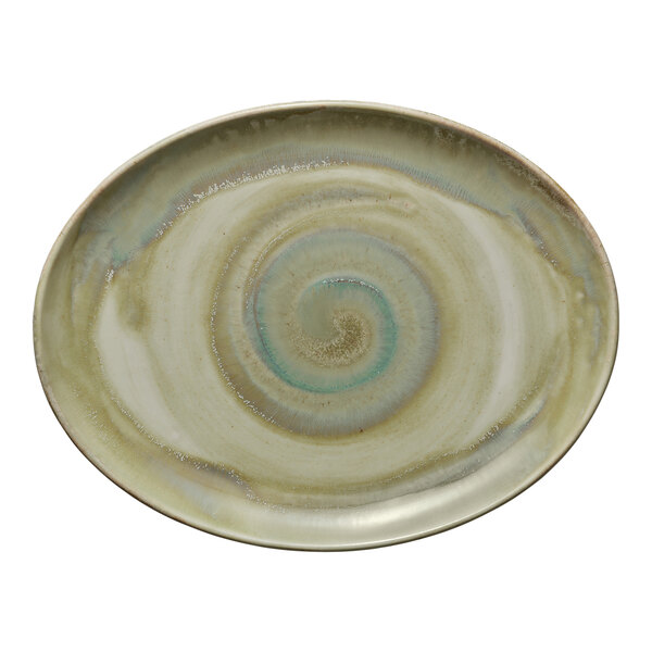 A white Heart & Soul oval coupe platter with a swirl design.