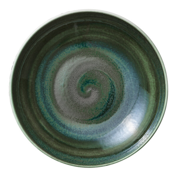 A close-up of a Heart & Soul Avocado Porcelain Deep Coupe Plate with a spiral design.