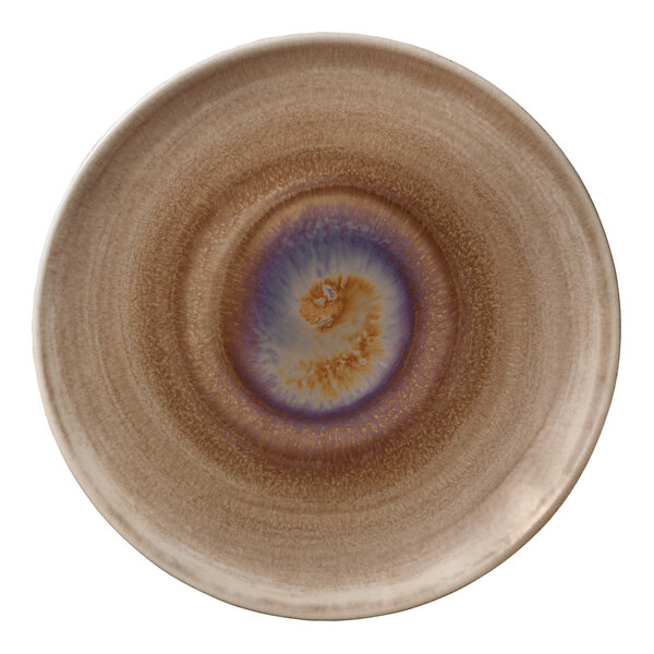 A close up of a white porcelain Heart & Soul oyster plate with a blue and brown swirl design.