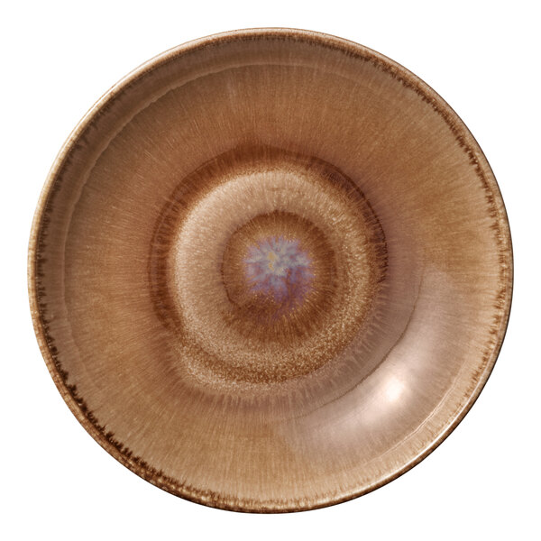 A brown porcelain plate with a blue circle in the center.