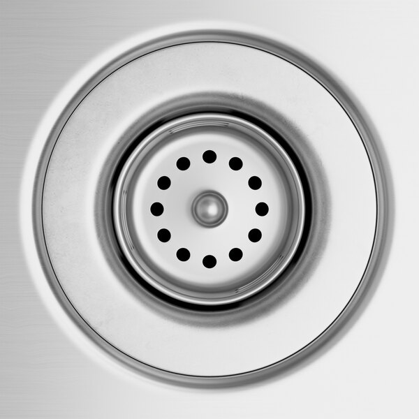 A close-up of a stainless steel sink drain on a Regency beverage table.