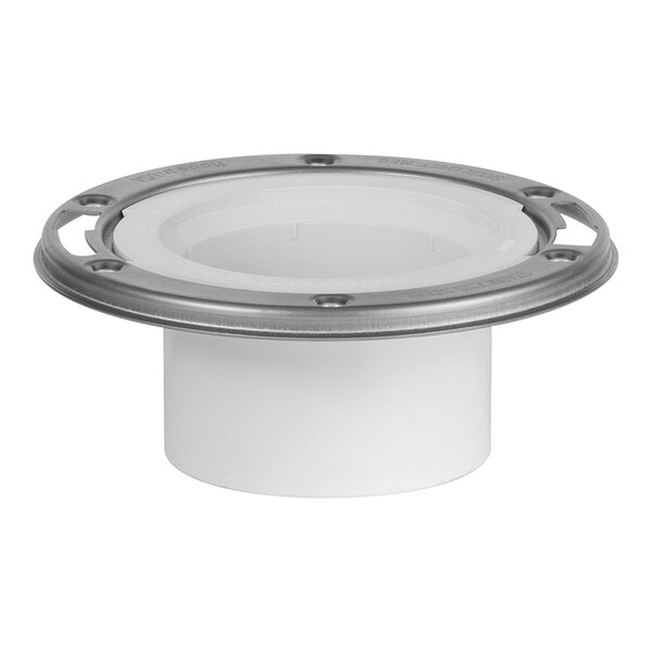 A white plastic Sioux Chief water closet flange with a stainless steel swivel ring.