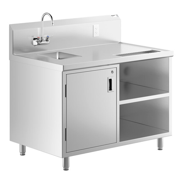 A stainless steel beverage table with a left-side sink, gooseneck faucet, backsplash, storage cabinet, and open shelves.
