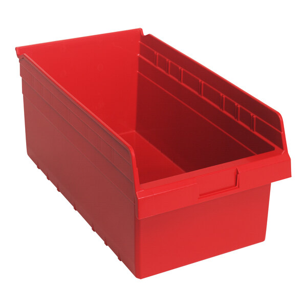 A red plastic Quantum shelf bin.