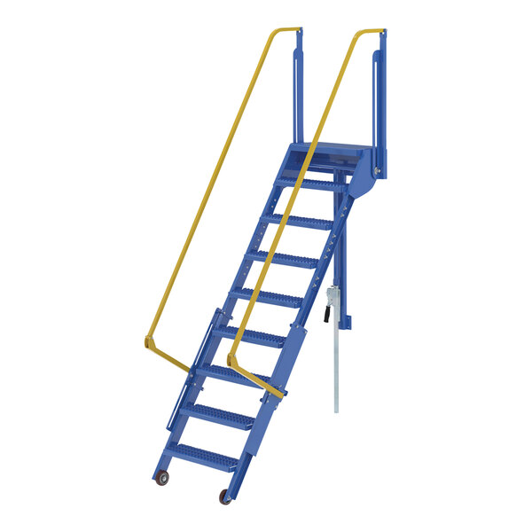 A blue steel Vestil mezzanine ladder with yellow handrails.
