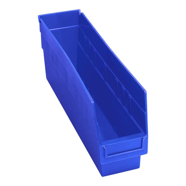 A blue plastic Quantum shelf bin with an open lid.