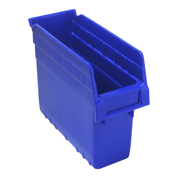 A blue plastic Quantum shelf bin with two compartments.