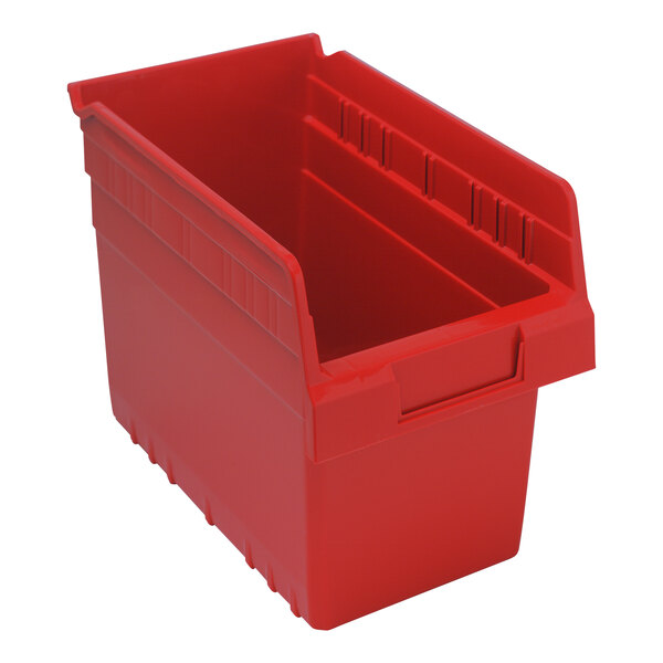 A red plastic Quantum shelf bin with two compartments.
