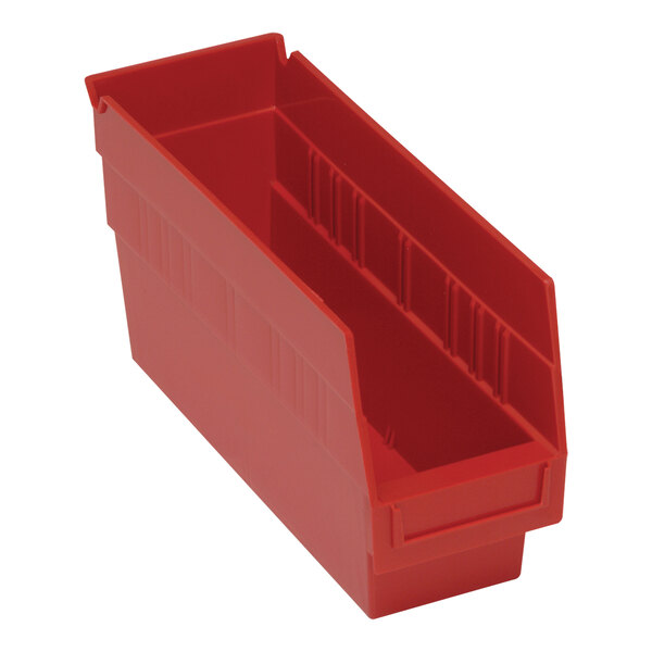 A close-up of a red Quantum shelf bin with a handle.