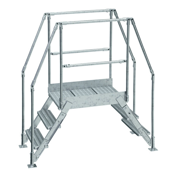 A Vestil galvanized steel crossover ladder with metal steps and railings.