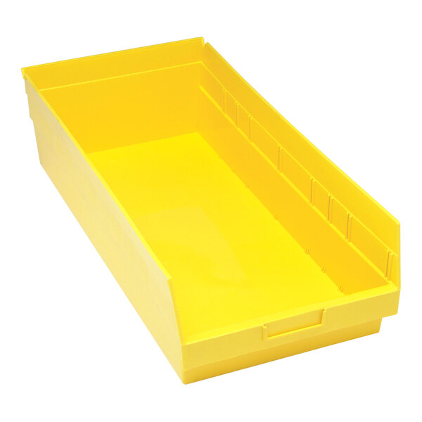 A yellow Quantum shelf bin with two compartments.