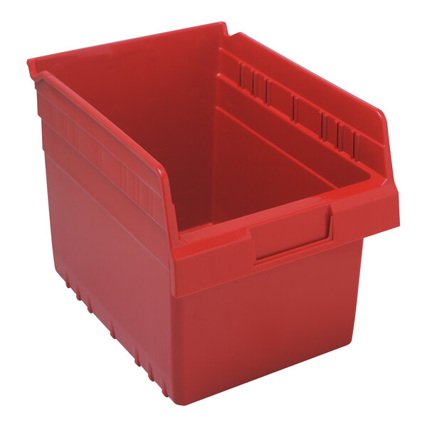 A red Quantum shelf bin with two compartments.