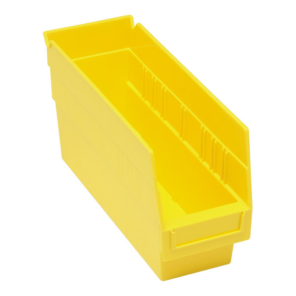 A yellow Quantum shelf bin with two compartments.