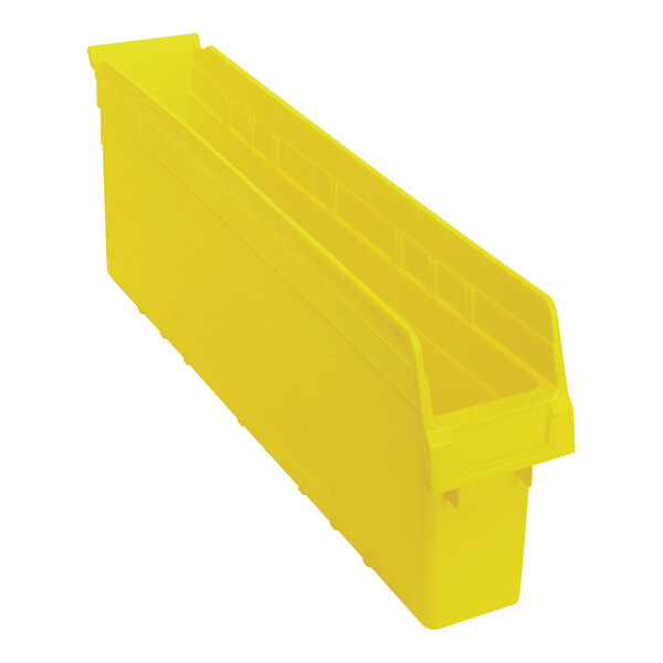 A yellow Quantum plastic shelf bin with two compartments.