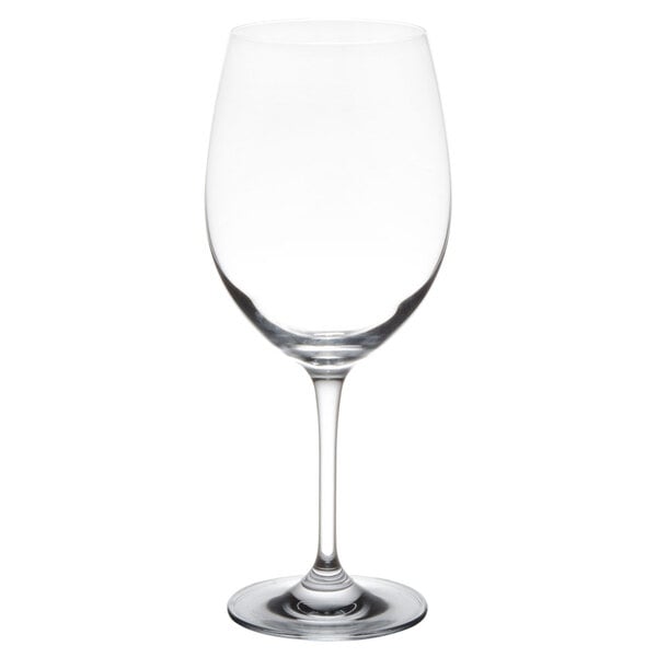 A close-up of a clear Stolzle Bordeaux wine glass with a stem.