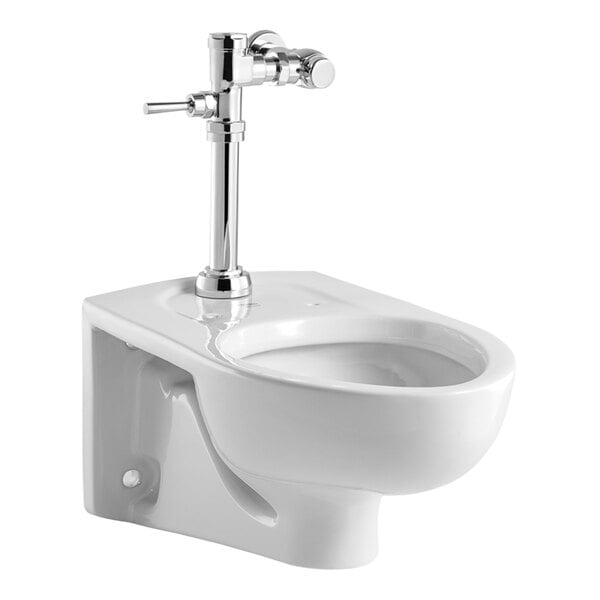 An American Standard white wall-mount toilet with a silver manual flush valve.
