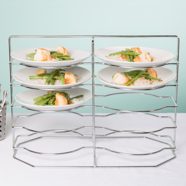 A Metro MBQ-P1-17 plate rack holding a plate of food with green beans and bread.