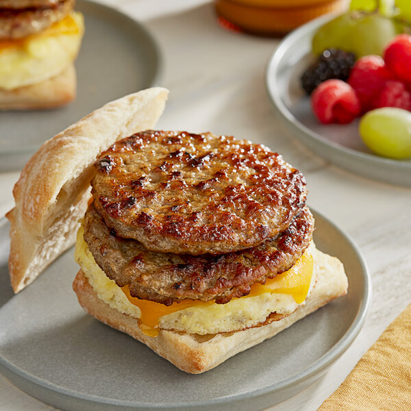 Hatfield 2 oz. Fully Cooked Pepper Sausage Patty - 80/Case