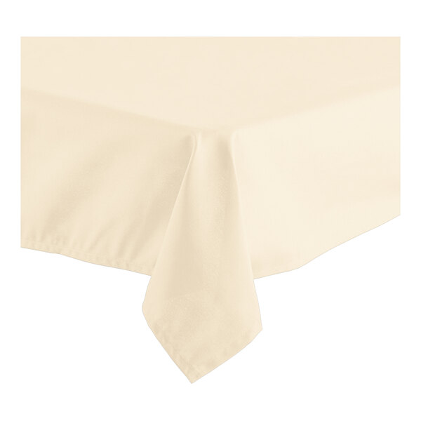 Oxford 54" x 96" Rectangular Ivory 100% Spun Polyester Hemmed Cloth Table Cover - 12/Case