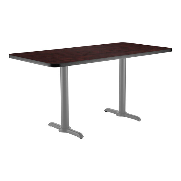 National Public Seating 30" x 72" Mahogany Standard Height Cafe Table with Particleboard Core, T Base, and Gray Frame