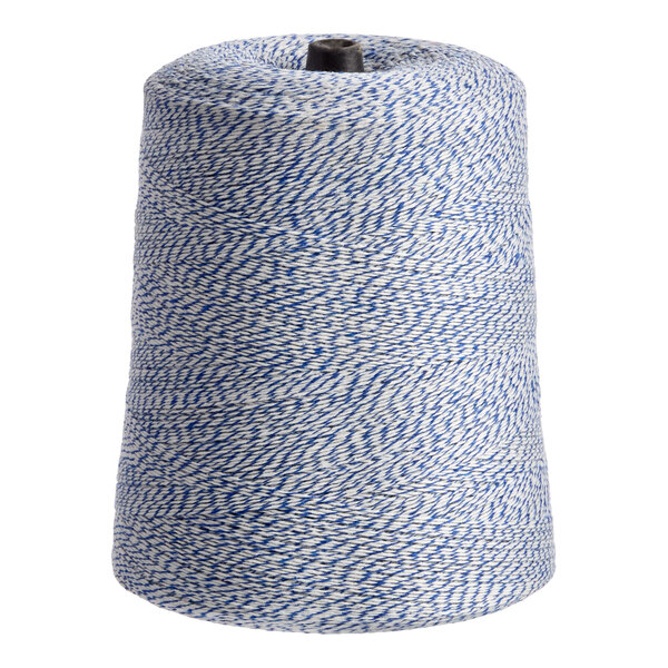 A cone of blue and white variegated polyester cotton blend baker's twine.