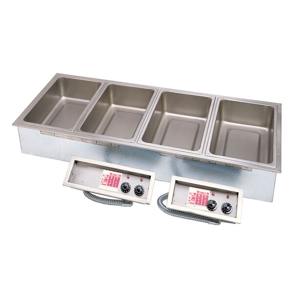 An APW Wyott stainless steel drop-in hot food well with three pans.