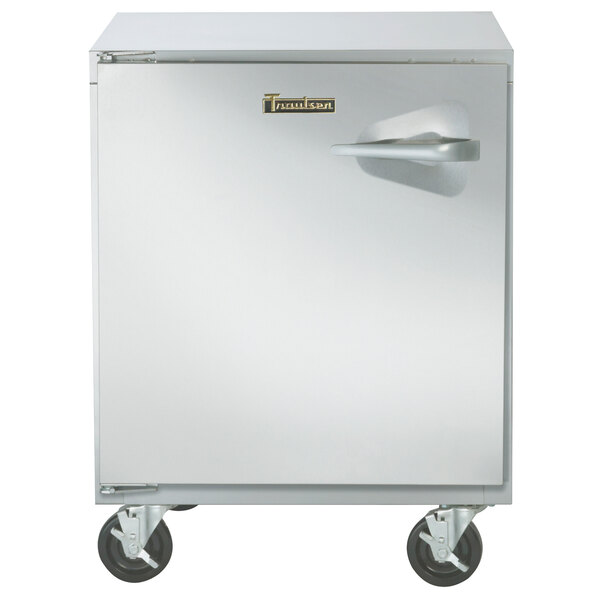 A Traulsen stainless steel undercounter freezer with wheels and a left hinged door.