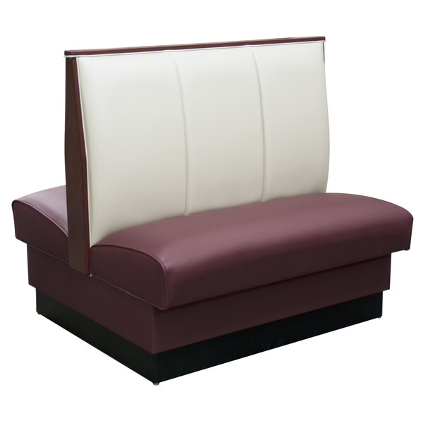 An American Tables & Seating Double Deuce upholstered booth in white and red leather.