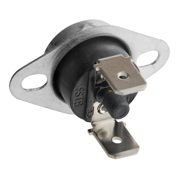 A metal and plastic temperature switch for a cappuccino or hot chocolate machine.