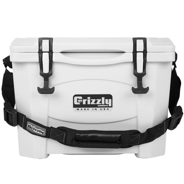 A white Grizzly cooler with black straps and a handle.
