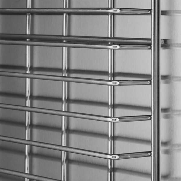 A stainless steel vacuum-insulated heated holding and proofing cabinet with horizontal wire shelves and clear Dutch doors.