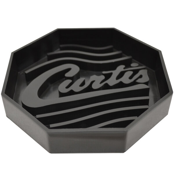 A black octagon-shaped plastic drip tray with the Curtis logo.