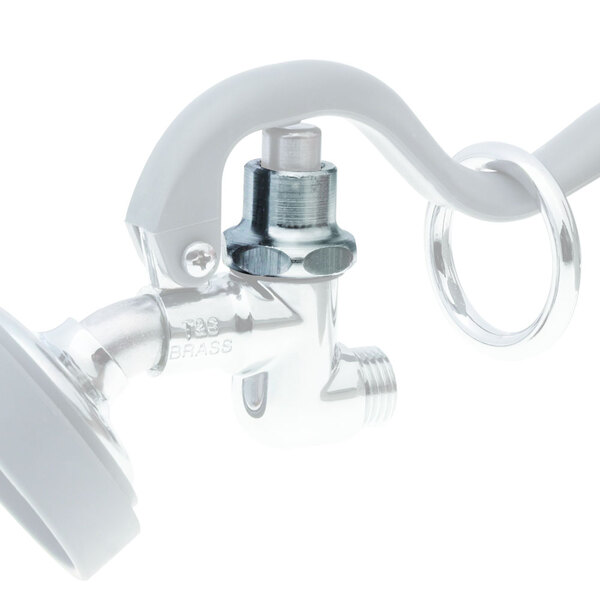 A chrome plated brass ring with a white squeeze valve.