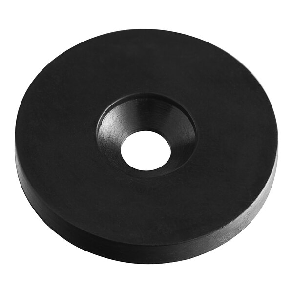 A black rubber disc with a white circle in the middle.