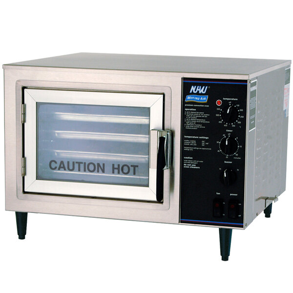 A NU-VU XO-1 half size electric countertop convection oven on a counter with a warning sign.