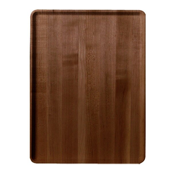 A Cambro dietary tray with a wood surface.