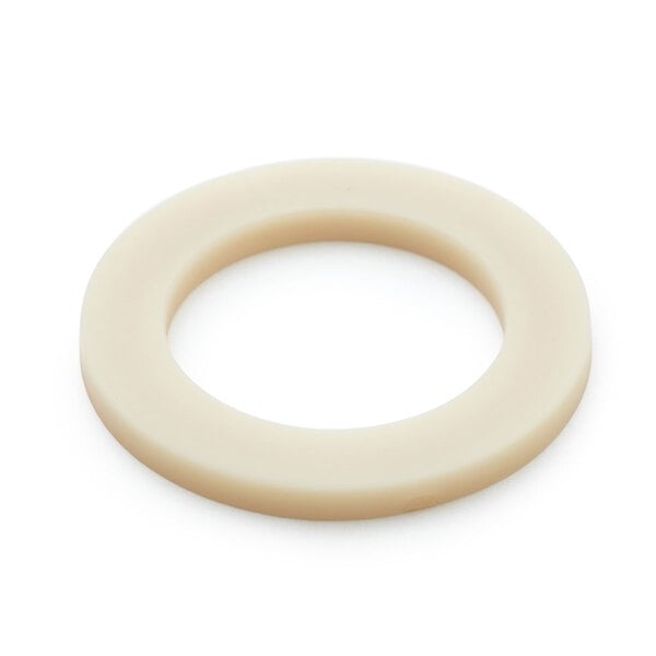 A close-up of a white rubber circle with a hole in the center.