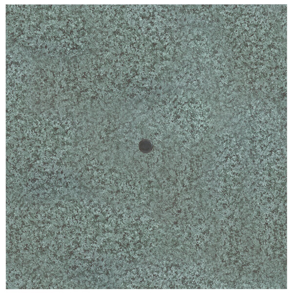 A grey square table top with a small black circle in the middle.