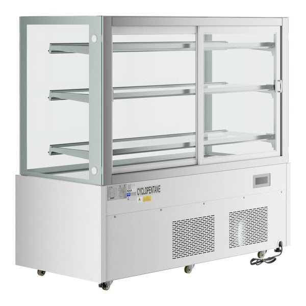 An Avantco white refrigerated bakery display case with glass doors and two shelves.