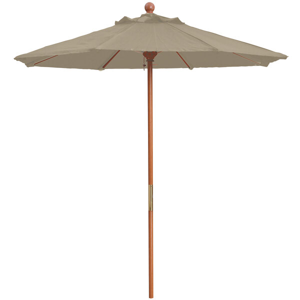 A Grosfillex taupe market umbrella with a wooden pole and handle.