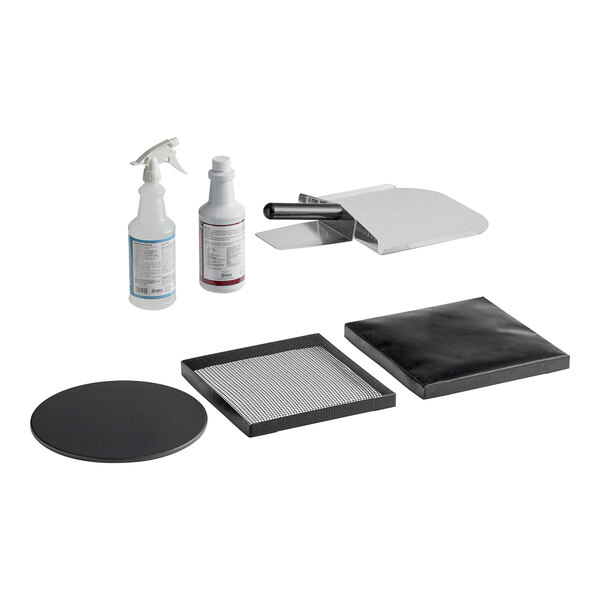 A black and white square box with a set of cleaning supplies inside.